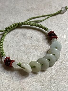 White jade adjustable lucky Chinese bracelet on green cord unisex